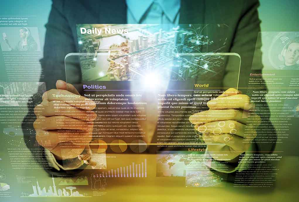 Person holding transparent tablet displaying digital news content