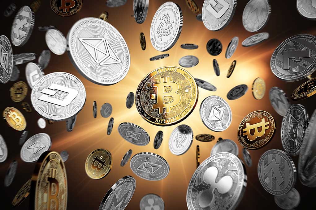 Gold and silver cryptocurrency coins floating together
