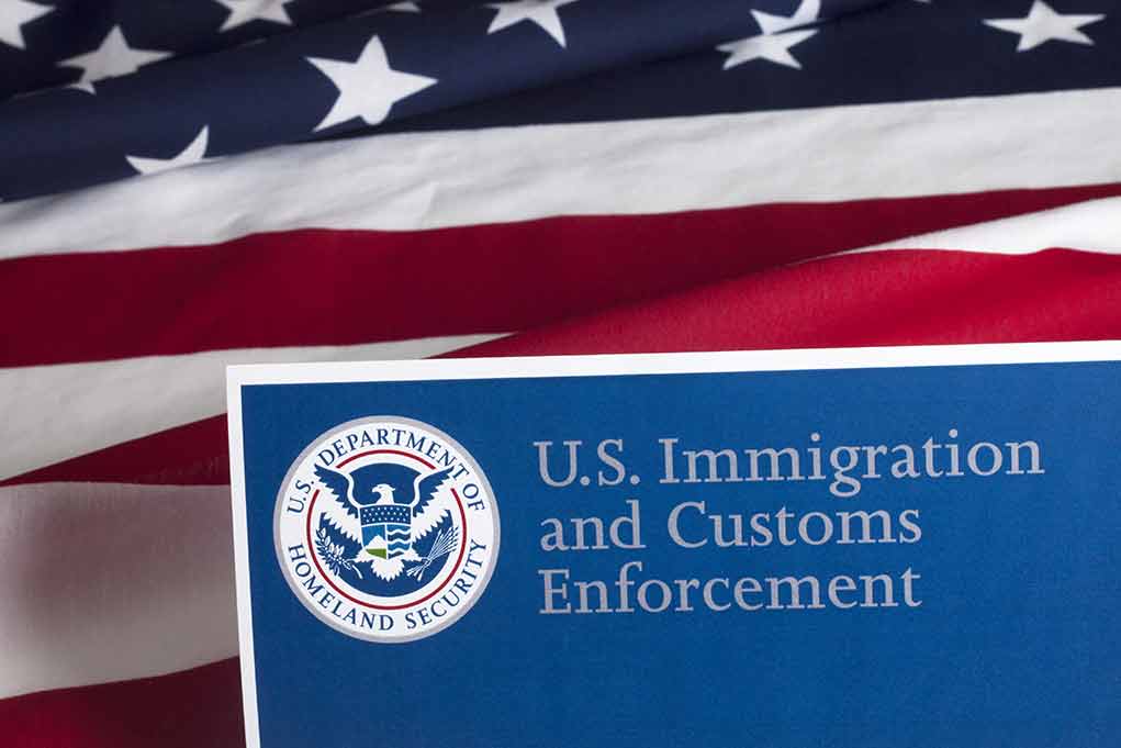 300476915 featured image US Immigration and Customs Enforcement document with flag