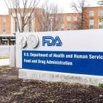 FDA Rehires Former Employees Amidst Federal Policy and Leadership Changes FDA building exterior with department signage near entrance
