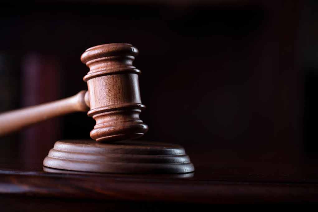 1917623645 featured image Wooden gavel on a dark background.