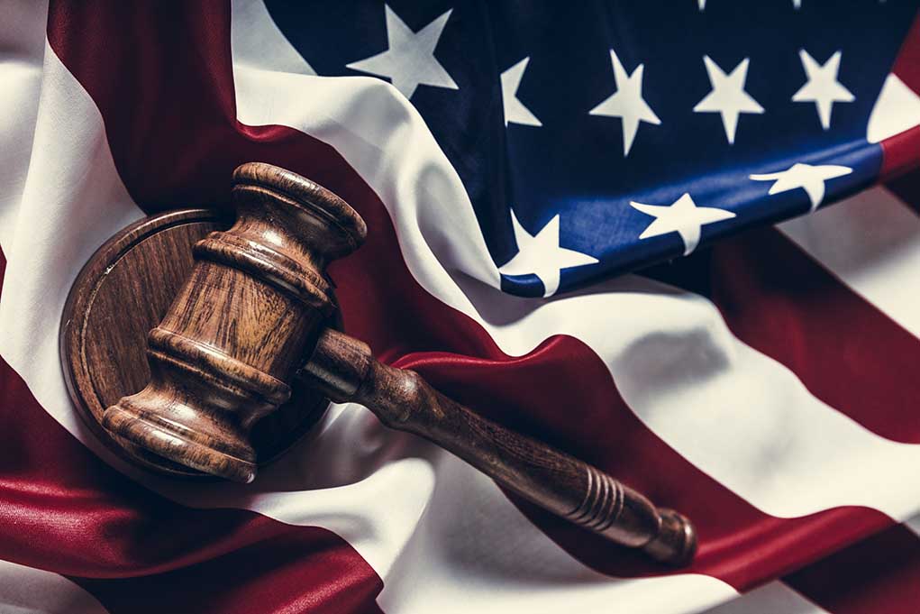 553692691 featured image Gavel resting on the American flag.