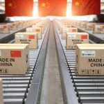 Chinese Ports See Slow in Traffic Amid Tariff Controversy Boxes labeled Made in China on conveyor belt