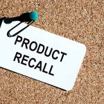 Product recall notice on a corkboard