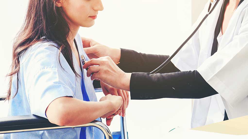 1630502584 featured image Doctor examining patient with stethoscope in hospital