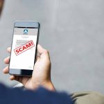Trojan Sneaks Past Security—Phones Compromised Instantly Person reading a scam message on a smartphone