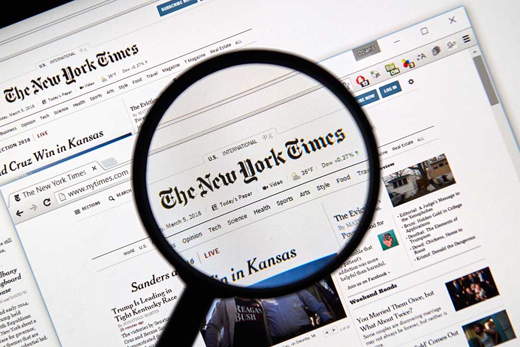 386787592 featured image Magnifying glass over The New York Times website