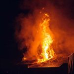 Nine DEAD—Who Let This Happen? Building engulfed in large flames at night