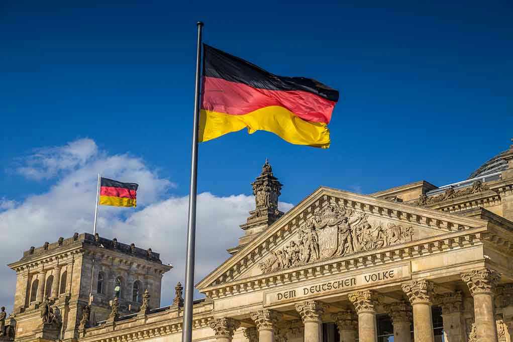 German flags at the Reichstag building in Berlin