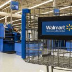 Inside Walmart’s Mysterious ‘Dark Stores’ Strategy Walmart shopping cart inside store near checkout aisle