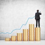 U.S. Wealth Fund Proposal – Free Market Under Siege? Businessman standing on stacks of coins, drawing a growth chart