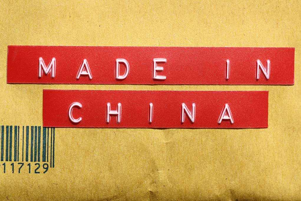 Red label reading 'MADE IN CHINA' on brown packaging