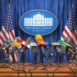 Multiple microphones at White House press briefing podium