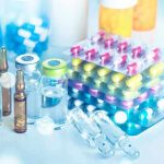 FDA’s New Powers: Big Pharma Under Siege! Vials and blister packs of pills on table