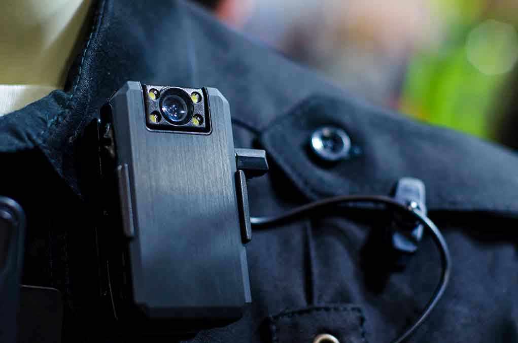 Body camera attached to a black uniform