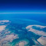 Reddit EXPOSES Disgusting Travel Industry Secret Aerial view of coastline and ocean