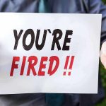 Viral Office Depot Showdown – Millions Outraged! Person holding YOURE FIRED sign