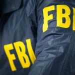 FBI jacket with yellow letters