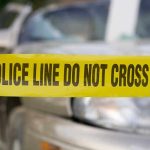 SHOCKING Religious Murder Case Rocks Florida Yellow police tape reading POLICE LINE DO NOT CROSS in front of a vehicle