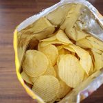 Armed Cops Invade Over… Chips?? Open bag of ridged potato chips