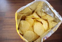 Armed Cops Invade Over… Chips?? Open bag of ridged potato chips