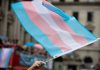 Transgender ID Plunge: Culture Shift Bombshell Transgender flag waving in a crowded street