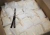 SHOCK Airstrike Kills Narco-Terrorists in Pacific Bags of white powder with scissors in cardboard box