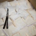SHOCK Airstrike Kills Narco-Terrorists in Pacific Bags of white powder with scissors in cardboard box