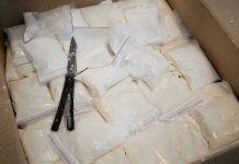 SHOCK Airstrike Kills Narco-Terrorists in Pacific Bags of white powder with scissors in cardboard box