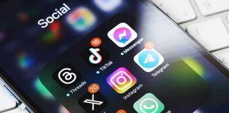 Smartphone showing social media app icons in a folder