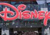 Controversy Hits Disney+: MASSIVE Fallout Bright red Disney logo displayed on a storefront window