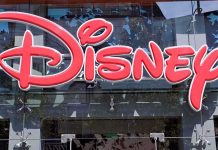 Controversy Hits Disney+: MASSIVE Fallout Bright red Disney logo displayed on a storefront window