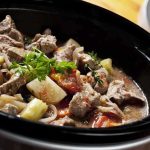 Argentine Beef Import Stuns U.S. Farmers A hearty beef stew with vegetables in a slow cooker