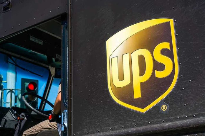 UPS delivery truck with driver inside cab
