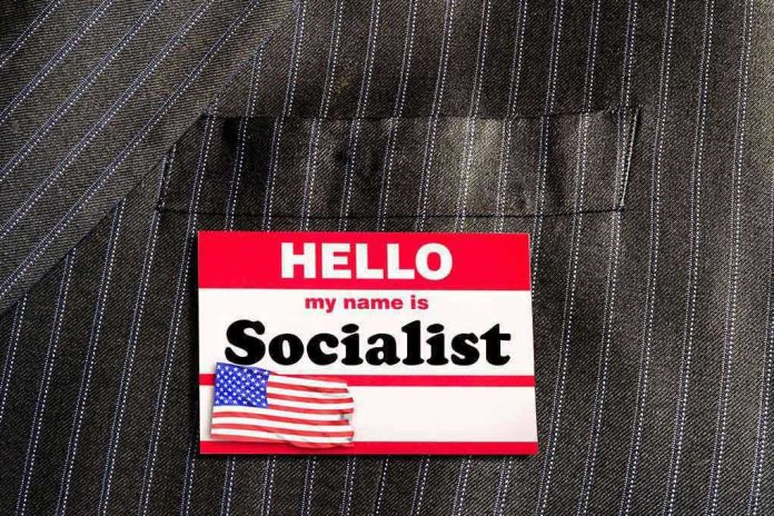 1306450240 Hello my name is Socialist name tag on suit