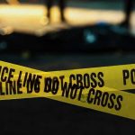 Former Adult Star DECAPITATES Mother’s Boyfriend Police tape marking a crime scene at night.