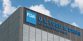 FDA building with blue logo and sky background