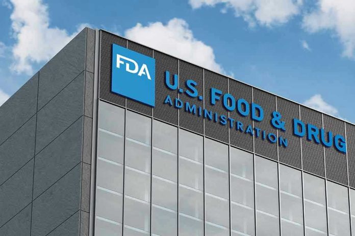 2454487921 FDA building with blue logo and sky background