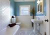 HORRIFYING 20-Pound Obstruction KILLS Group Home Resident Modern bathroom with blue walls and white fixtures.