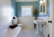 HORRIFYING 20-Pound Obstruction KILLS Group Home Resident Modern bathroom with blue walls and white fixtures.