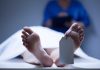 Quebec’s SHOCKING 7.2% Euthanasia Rate – World’s Highest! A deceased body on a table with a tag on the foot, and a medical professional in the background