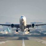 Airline Rewards Just Became Worthless An airplane taking off from an airport runway