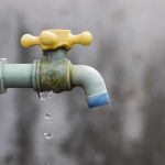 100K Citizens Left WITHOUT Water Close-up of a dripping outdoor water faucet