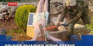 IDF Reservist Caught SMASHING Sacred Catholic Symbol