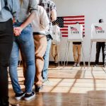 Trump’s Savage Attack: Massie Under Siege People in line at voting booths.