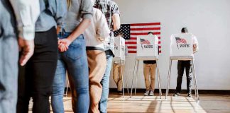 Trump’s Savage Attack: Massie Under Siege People in line at voting booths.