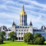 Pastor’s Shocking Declaration: ‘Count Me In!’ Connecticut State Capitol building with a golden dome and surrounding greenery