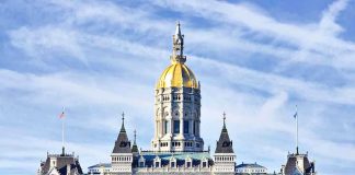 Pastor’s Shocking Declaration: ‘Count Me In!’ Connecticut State Capitol building with a golden dome and surrounding greenery