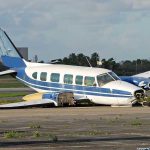 Frozen Speed System Crashes Texas Flight! Damaged blue and white small airplane on an airport runway