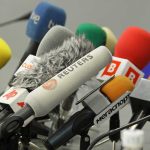 Hunter Biden UNLEASHES Shocking Admission on Owens’ Show! A collection of various microphones arranged for a press conference